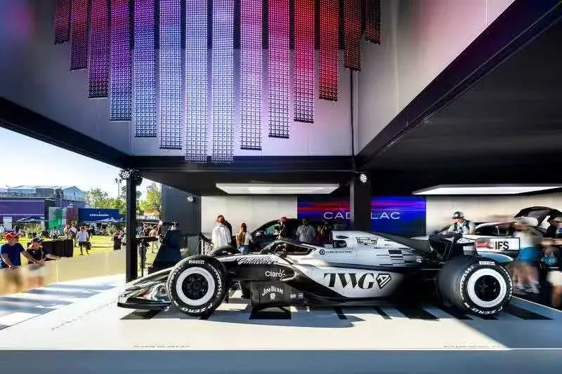 LED ceiling and backdrop installation above a motorsport showcase